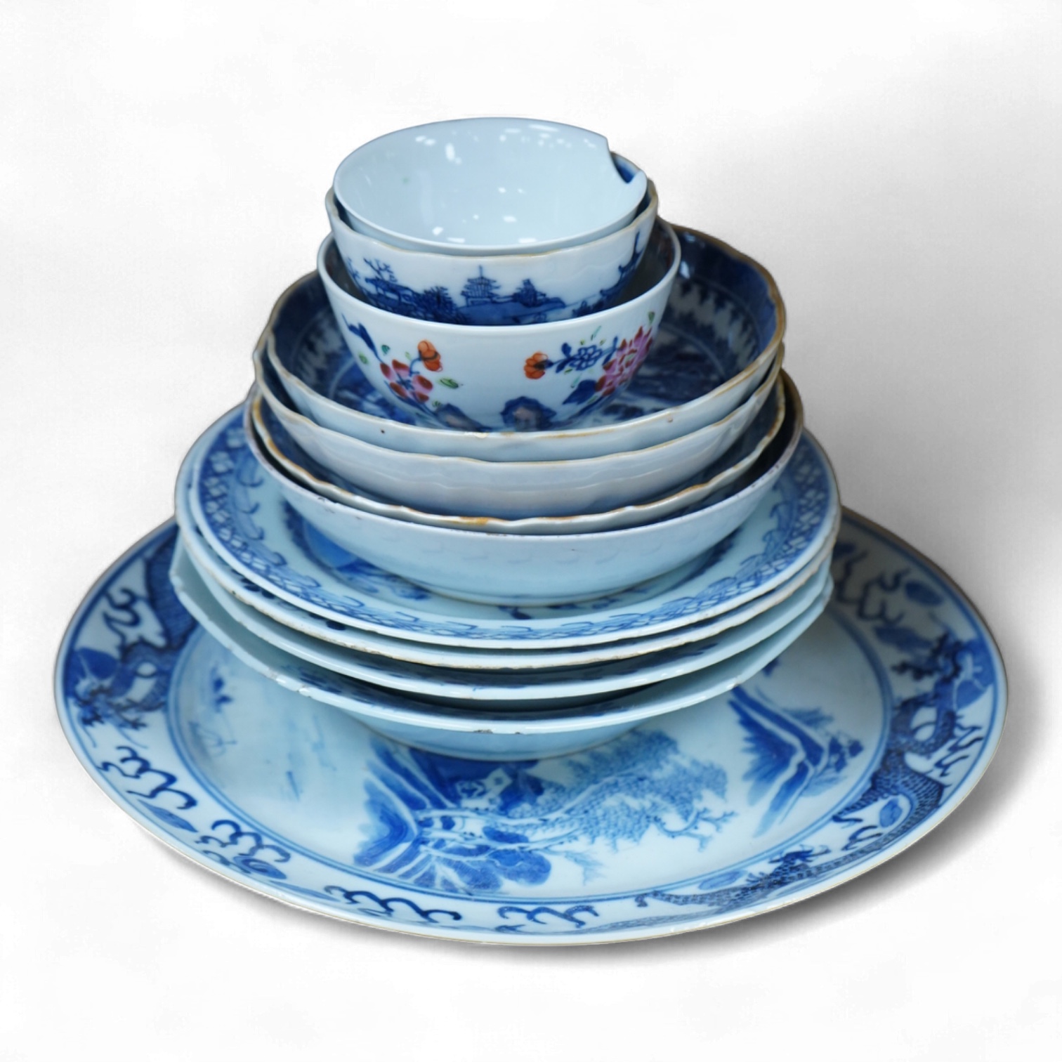 A group of 18th/19th century Chinese blue and white plates and dishes, largest 23cm in diameter
